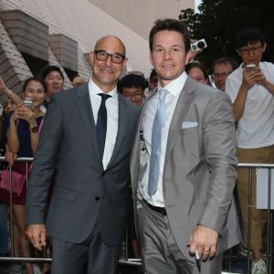 Mark Wahlberg and Stanley Tucci at event of Transformeriai isnykimo amzius 2014