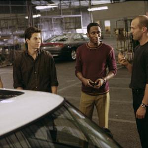 (Left to right) Charlize Theron as Stella, Mark Wahlberg as Charlie Croker, Mos Def as Left Ear and Jason Statham as Handsome Rob