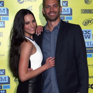 Paul Walker and Genesis Rodriguez at event of Hours (2013)