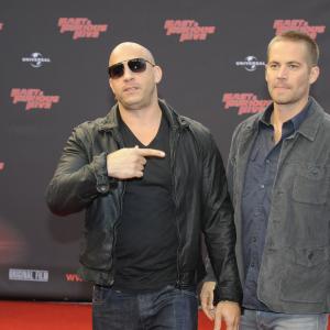 Vin Diesel and Paul Walker at event of Greiti ir isiute 5 (2011)