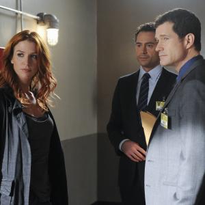 Still of Poppy Montgomery Dylan Walsh and Omar Metwally in Unforgettable 2011