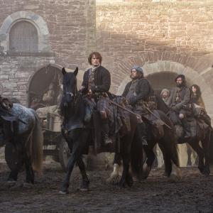 Still of Stephen Walters Sam Heughan Grant ORourke Caitriona Balfe and Duncan Lacroix in Outlander 2014