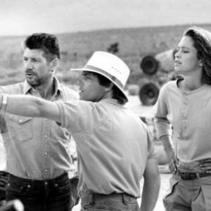 FRED WARD, Director RON UNDERWOOD and FINN CARTER on the set of TREMORS.