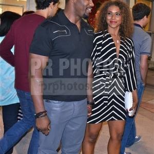 Actor Michael Jai White and girlfriend, actress Gillian Iliana Waters holding hands, leaving Elysium premiere in Westwood.