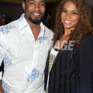 Actress Gillian Iliana Waters and actor Michael Jai White attend Independent Hollywoods Back Then movie premiere at LA Live in Los Angeles CA
