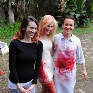 Craig Watkinson as Dr Ian Klein with victims Sasha Venn and Hayley Farrell in Tyler SobelMasons upcoming horror film The Hoarder