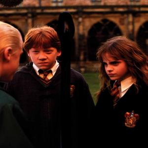 Still of Tom Felton, Rupert Grint and Emma Watson in Haris Poteris ir paslapciu kambarys (2002)