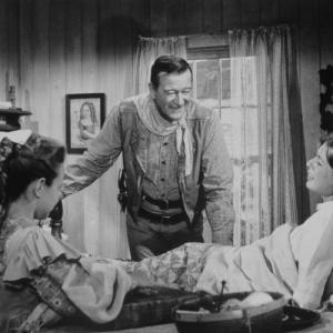 Still of John Wayne and Aissa Wayne in The Comancheros (1961)