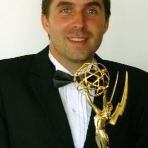 Marc Weigert with his EMMY award for The Triangle