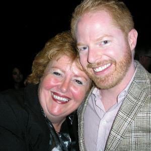 Dear old friends MODERN FAMILYs Jesse Tyler Ferguson and THE NEIGHBORs Tracy Weisert backstage at the 2012 PaleyFest