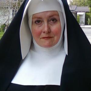 The very serious Mother Superior Tracy Weisert