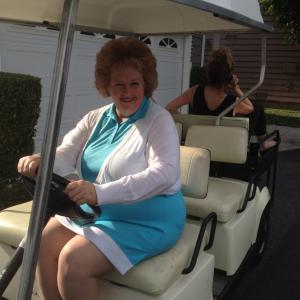 Tracy Weisert on THE NEIGHBORS driving our famous golf carts!