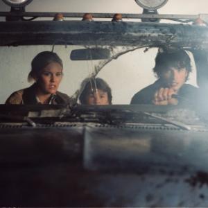 Still of Rob McEwan, Tom Welling, Maggie Grace and Cole Heppell in Rukas (2005)