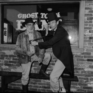 Historical Photograph  Frank McGrath visits Ghost Town as a celibrity gunfighter for RB Coburn 1963 Pictured with him is Robert Doyle Teaster Director Dean Teasters father the original Digger the Undertaker Ghost Town The Movie is made as a tribute to Robert Doyle Teaster one of the Internationally Famous Ghost Town Gunfighters of the 60s era Sincere thanks to Pal Parker Jr and Russ Parker for discovering this photo in their Ghost Town archives
