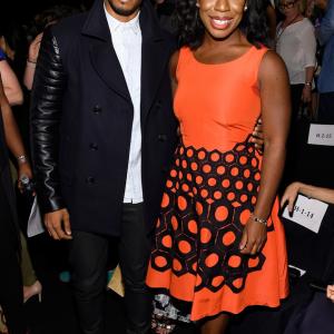 Actor Eric West and actress Uzo Aduba attend the Vivienne Tam fashion show during MercedesBenz Fashion Week Spring 2015 at The Theatre at Lincoln Center on September 7 2014 in New York City