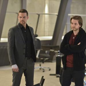 Still of Aaron Stanford and Shane West in Nikita (2010)