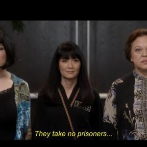 Screen shot from Arrested Development Season 4 Episode 10 Queen B Suzanne plays Olive Garden Asian prison gang leader