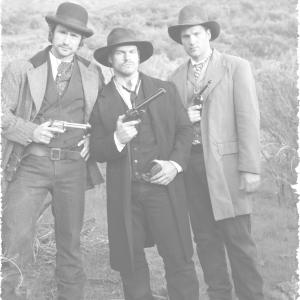 The First Ride of Wyatt Earp cast from l to r Matt Dallas as Bat Masterson Shawn Roberts as Wyatt Earp and Scott Whyte as Charlie Bassett