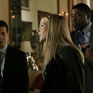 Still of Jennifer Finnigan and Cress Williams in Close to Home 2005