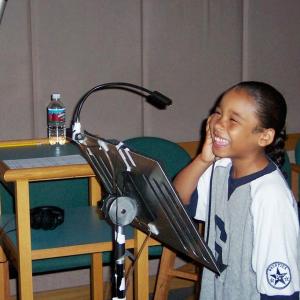 Zachary recording a voice in the studio