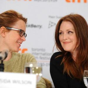 Erin Cressida Wilson and Julianne Moore speaking at the Chloe press conference during the Toronto Film Festival