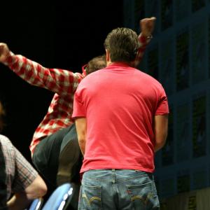 Rainn Wilson and Nathan Fillion try to answer the fan question Who would win in a fight Dwight Schrute or Mal?