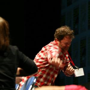 Rainn Wilson and Nathan Fillion in the process of answering the fan question, 