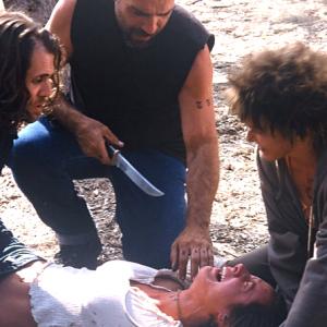 Film still from the true crime feature film CHAOS. From left to right: Stephen Wozniak as 'Frankie', Kevin Gage as 'Eddie 