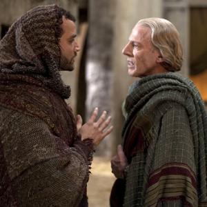 Solonius (Craig Walsh-Wrightson) bribes Ashur (Nick Tarabay) in 'Spartacus Blood and Sand'
