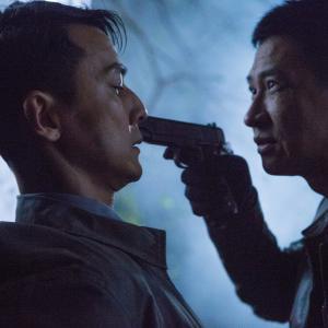 Still of Nick Cheung and Daniel Wu in Mo jing (2014)
