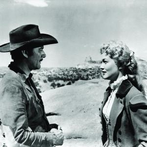 Still of Errol Flynn and Patrice Wymore in Rocky Mountain (1950)