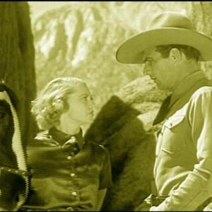Tom Tyler and Carol Wyndham in Roamin Wild 1936