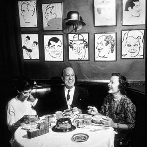 Ed Wynn and Millie Perkins at the Brown Derby restaurant, 1959.