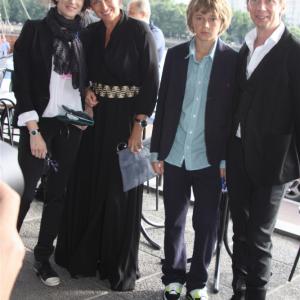 Kseniya Rappoport, Tatyana Lyutaeva with son Domenic, Vyacheslav Yakovlev (Slava N Jakovleff) during the opening ceremony of The XX Russian Filmfestival 