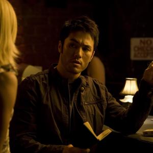 Jason Yee as 'Jake' with Dominique Swain in a scene from 'The Girl From The Naked Eye'.