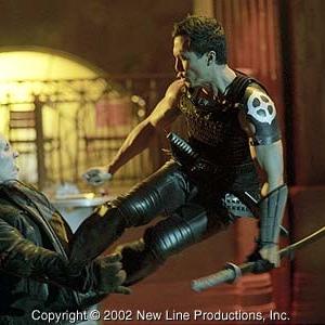 Snowman (Donnie Yen, right) battles a Reaper in New Line Cinema's action thriller, BLADE II.