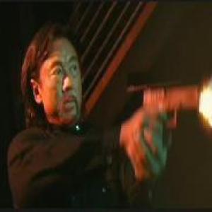 Hitman fires his handgun at FBI agent in nightclub