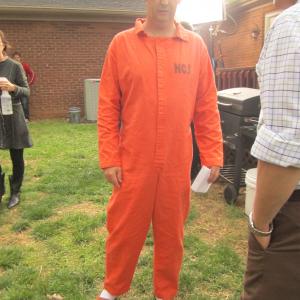 Skunk in custom made prison jumpsuit for Back in the Day
