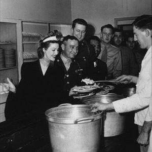 Loretta Young boosting morale at an Army base C. 1944
