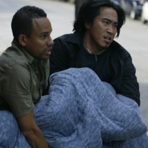 Hill Harper and Ron Yuan dispose of a body in  The Shanghai Hotel 