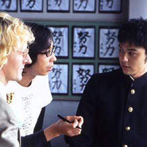 Christian Storms (left) with Director Isao Yukisada (middle), Satoshi Tsumabuki (right) on the set of JAM FILMS: JUSTICE (2002)