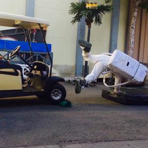Stuntman James Zahnd taking another hit in his Astronaut suit by a golf cart