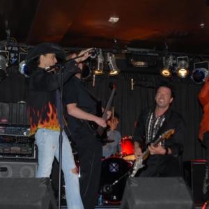 Stephen Pearcy and Peter DiStefano on stage together at the Lonely Seal Releasing concert