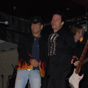 Stephen Pearcy and Peter DiStefano, on stage at the concert filmed and produced by Lonely Seal Releasing.