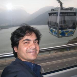 Hammad Zaidi on the sky tram en rout to the Tain Tan Buddha just outside Hong Kong