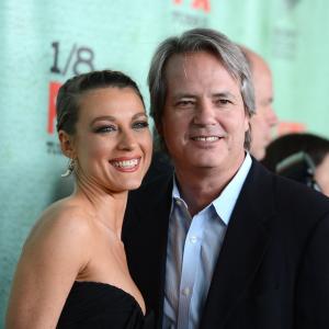 Natalie Zea and Graham Yost attend the Premiere Of FXs Justified Season 4