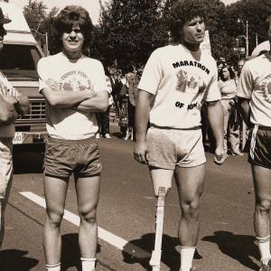 Robert Duvall, Chris Makepeace, Eric Fryer, and Michael Zelniker on set for THE TERRY FOX STORY