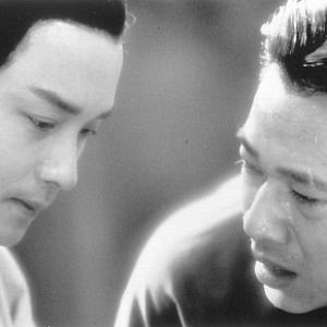 Still of Leslie Cheung and Fengyi Zhang in Ba wang bie ji (1993)