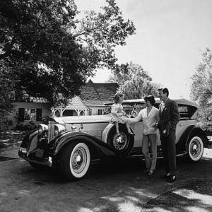 Efrem Zimbalist Jr with his family at his home in Encino and with his 1938 Packard