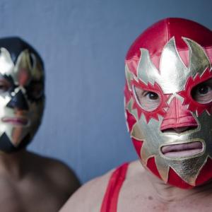 Father and son luchadores (wrestlers), Solar Jr. (left) and Solar (right) from the film, 